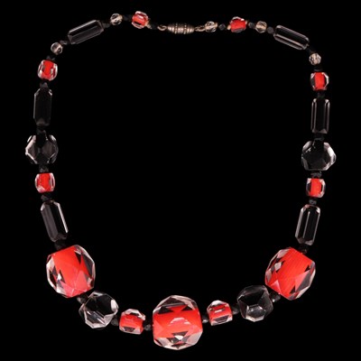 Lot 1530 - A striking Art Deco period facetted glass bead...