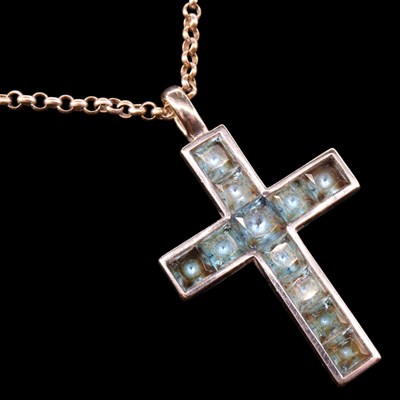 Lot 1448 - A near-contemporary blue topaz pendant cross...