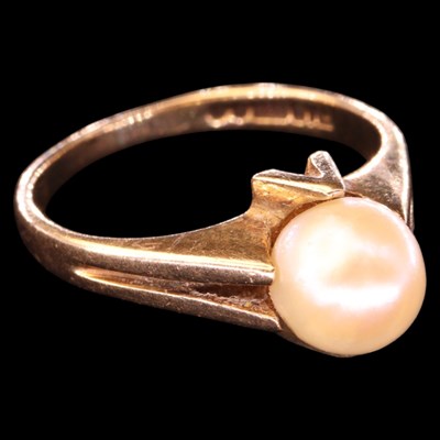 Lot 1449 - A 1970s pearl solitaire ring, comprising a...