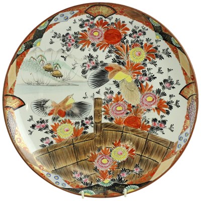 Lot 842 - A Japanese Kutani porcelain charger, decorated...