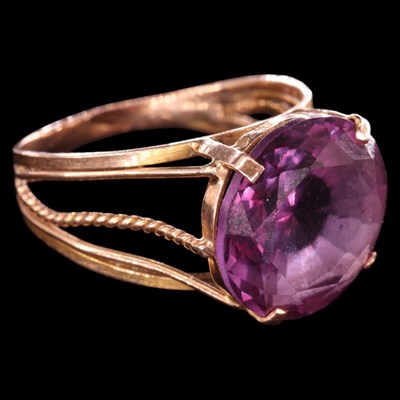 Lot 1463 - An Egyptian lilac sapphire and yellow metal...