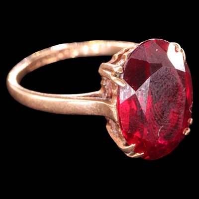 Lot 1465 - A vintage ruby solitaire ring, comprising an...