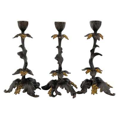 Lot 818 - Three late 19th Century parcel-gilt cast-iron...