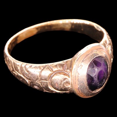 Lot 1475 - A vintage amethyst solitaire ring, comprising...