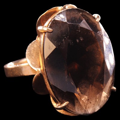 Lot 1477 - A 1970s smoky quartz cocktail ring, comprising...