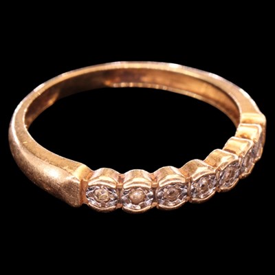 Lot 1484 - A vintage diamond half-hoop eternity...