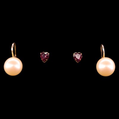 Lot 1487 - A pair of 1980s heart-shaped amethyst-coloured...