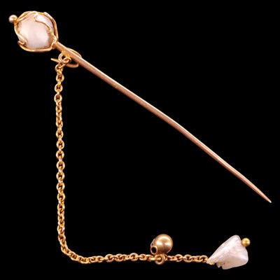Lot 1494 - A vintage caged baroque pearl and yellow metal...