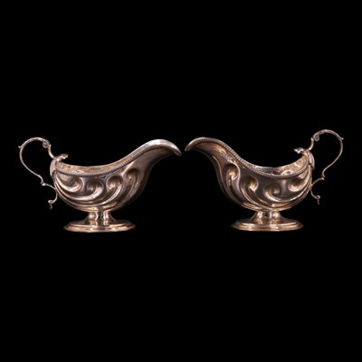 Lot 1195 - A pair of late Victorian silver sauce boats,...