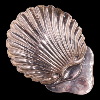 Lot 1197 - An Edwardian silver shell-form butter...