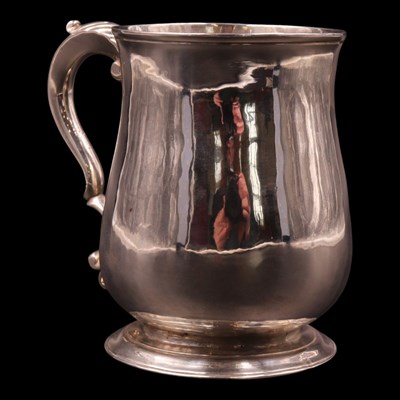 Lot 1201 - A George III silver baluster mug, having an...