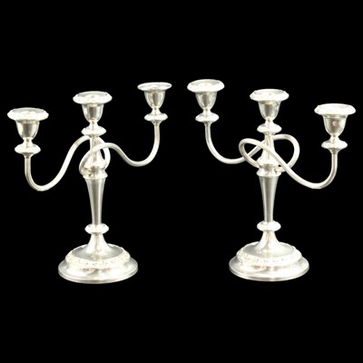 Lot 1288 - A pair of electroplated three-branch...