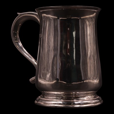Lot 1203 - A 1950s Harrods silver mug, having a subtly...