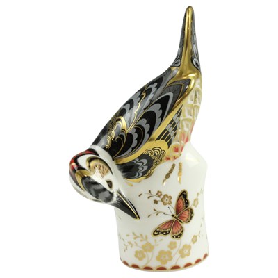 Lot 944 - A Royal Crown Derby Great spotted woodpecker...