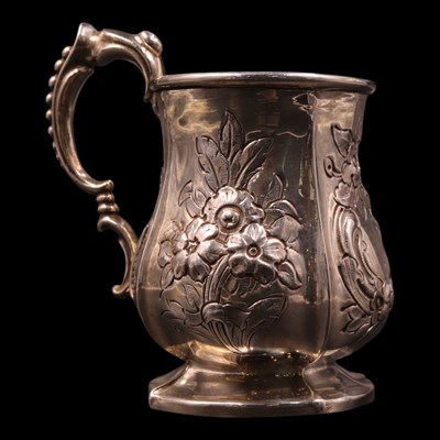 Lot 1209 - A Victorian silver baluster mug, of lobed form,...