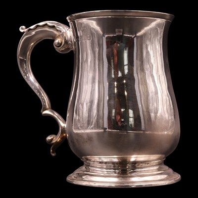 Lot 1212 - A George IV silver baluster mug, having an...