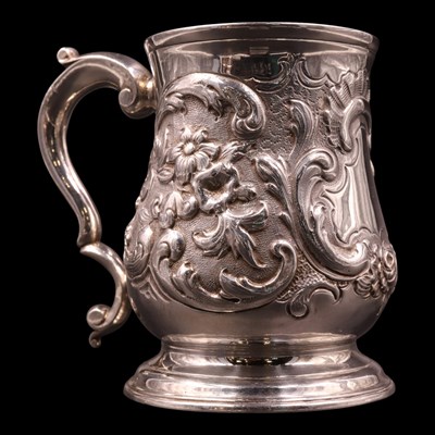 Lot 1214 - A George II silver baluster mug, bearing a...