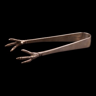 Lot 1219 - Victorian silver sugar tongs, having claw-form...