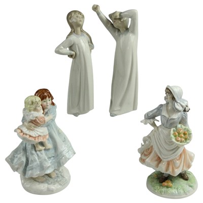 Lot 1030 - A Royal Worcester "Love" figurine, together...
