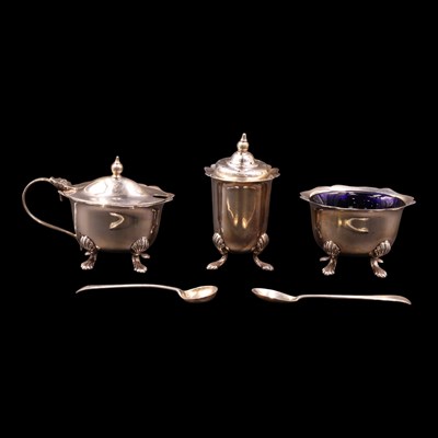 Lot 1231 - A 1930s silver three-piece cruet set,...