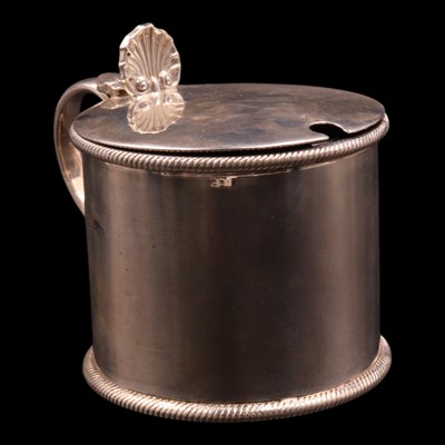 Lot 1232 - A 1920s silver mustard pot, of drum form with...