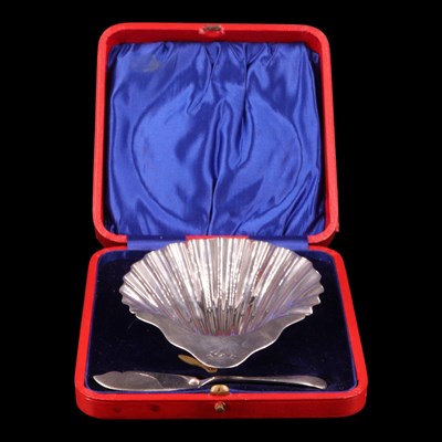 Lot 1237 - A cased Victorian silver butter shell,...