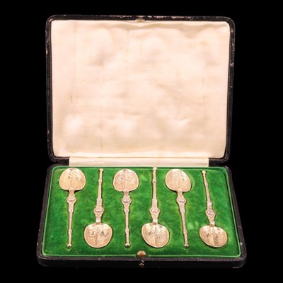 Lot 1238 - A set of six Edwardian silver gilt anointing...