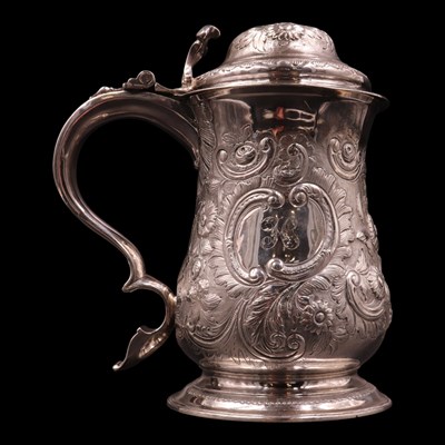 Lot 1243 - A George II silver baluster tankard, having a...