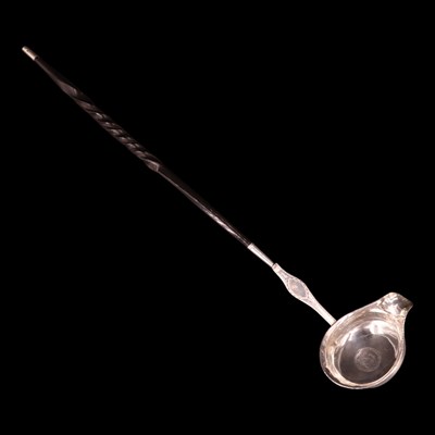 Lot 1253 - An 18th Century baleen-handled silver toddy...