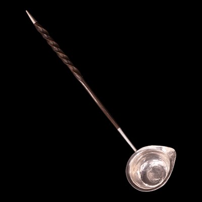Lot 1254 - An 18th Century baleen-handled silver toddy...