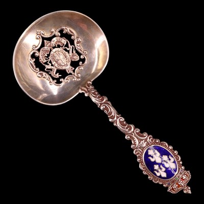 Lot 1255 - An early 20th Century enamelled white metal...