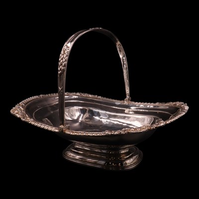 Lot 1256 - A George IV silver swing-handled basket,...