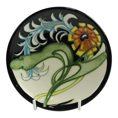 Lot 863 - A Moorcroft "Lily Plume" pin dish, 12 cm