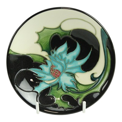 Lot 866 - A Moorcroft "Sea Holly" pin dish, 12 cm