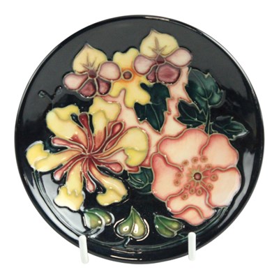 Lot 867 - A Moorcroft "Oberon" pin dish, 12 cm