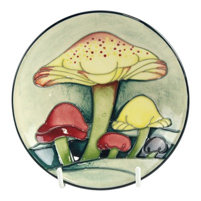 Lot 868 - A Moorcroft "Fairy Rings" pin dish, 12 cm