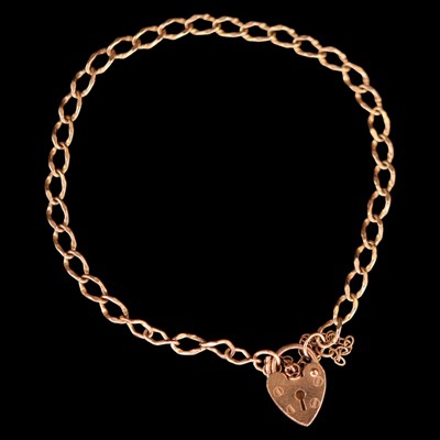 Lot 1411 - A near-contemporary 9 ct gold curb-link...