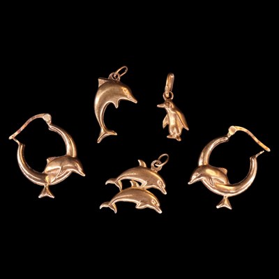 Lot 1414 - Vintage 9 ct yellow metal dolphin charms and...