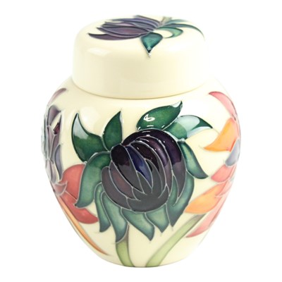 Lot 881 - A Moorcroft "Ruby Red" ginger jar, having...