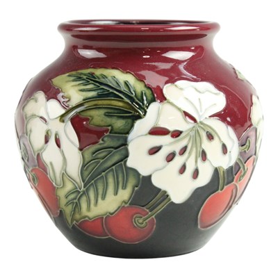 Lot 883 - A Moorcroft "Cherry Blossom" small vase,...