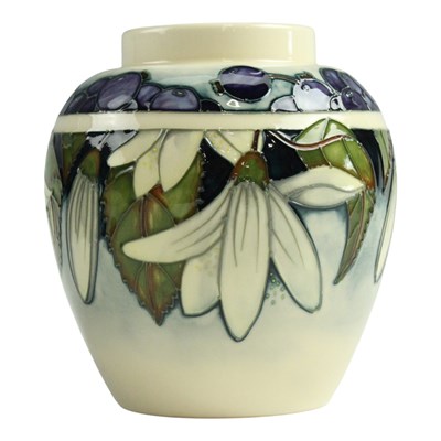 Lot 888 - A Moorcroft "Juneberry" vase, having original...