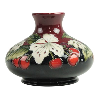 Lot 889 - A Moorcroft "Cherry Blossom" squat vase,...