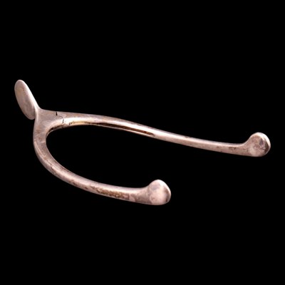 Lot 1190 - George V silver novelty wishbone sugar...