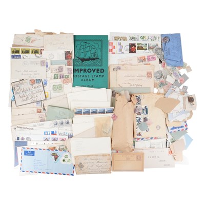 Lot 527 - A juvenile album of world stamps, together...
