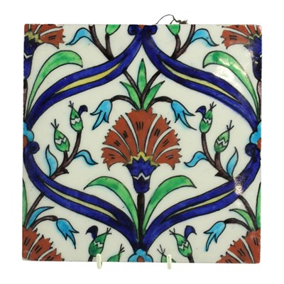 Lot 984 - A Turkish / Iznik ceramic tile, 20th Century,...