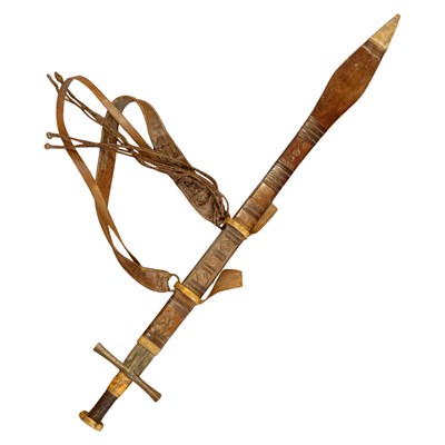 Lot 313 - A North African kaskara sword, (blade seized...