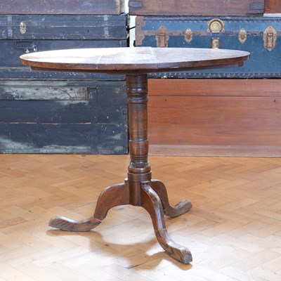 Lot 1683 - A late Georgian oak tripod tea table, 88 cm...