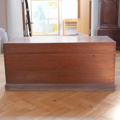 Lot 1692 - A mid 20th Century teak trunk, of dovetailed...