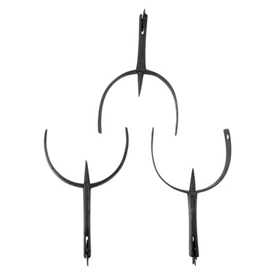 Lot 677 - Three 19th Century iron rowel spurs, 10 cm