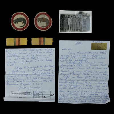Lot 146 - A group of Second World War cloth badges and...